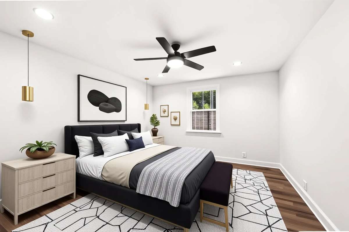 Spare bedroom 2 has great space and a new ceiling fan.
