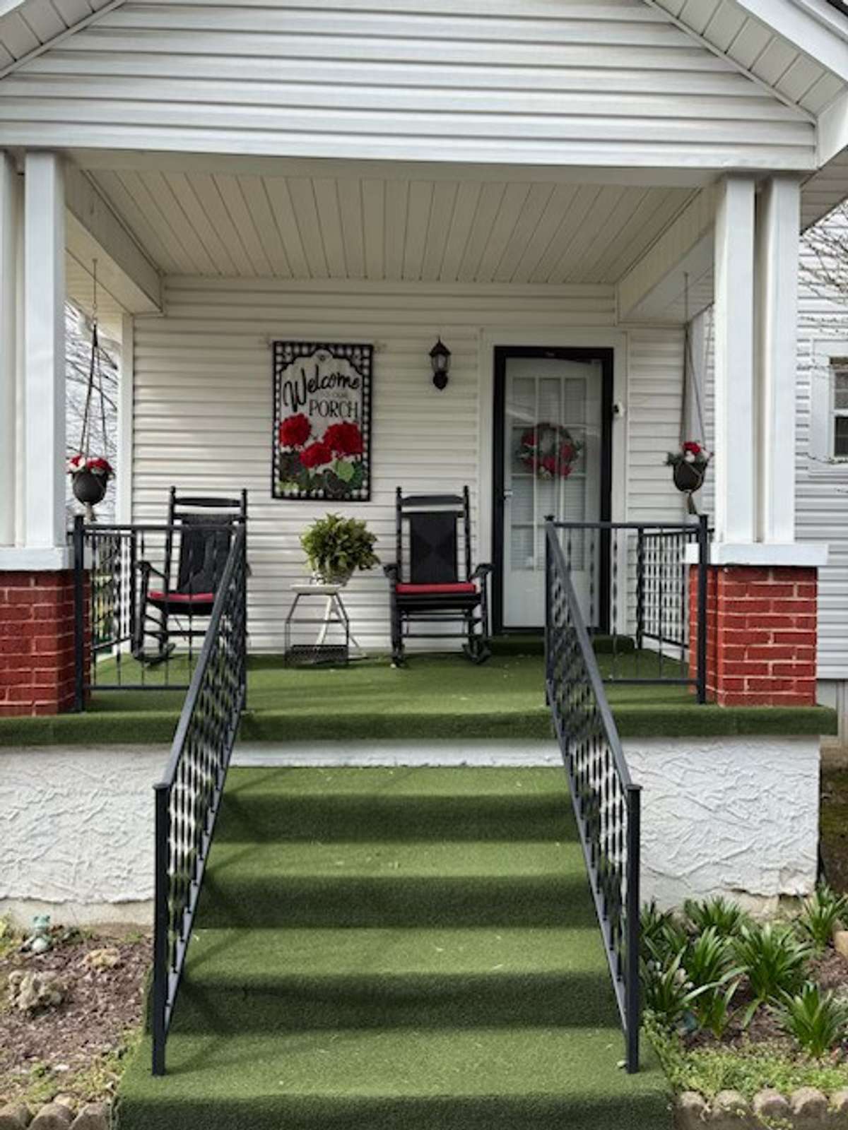 View of side porch for relaxing in the warm summer afternoons