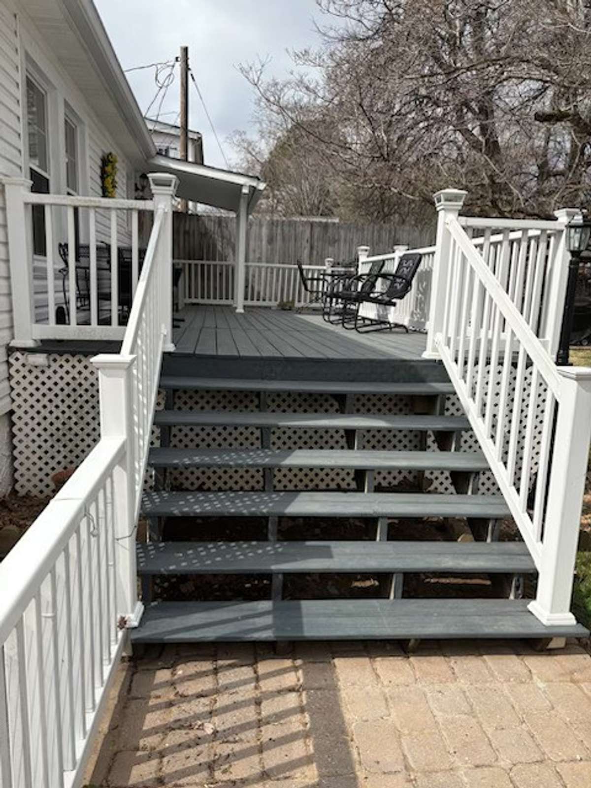 Steps going from driveway area to back deck