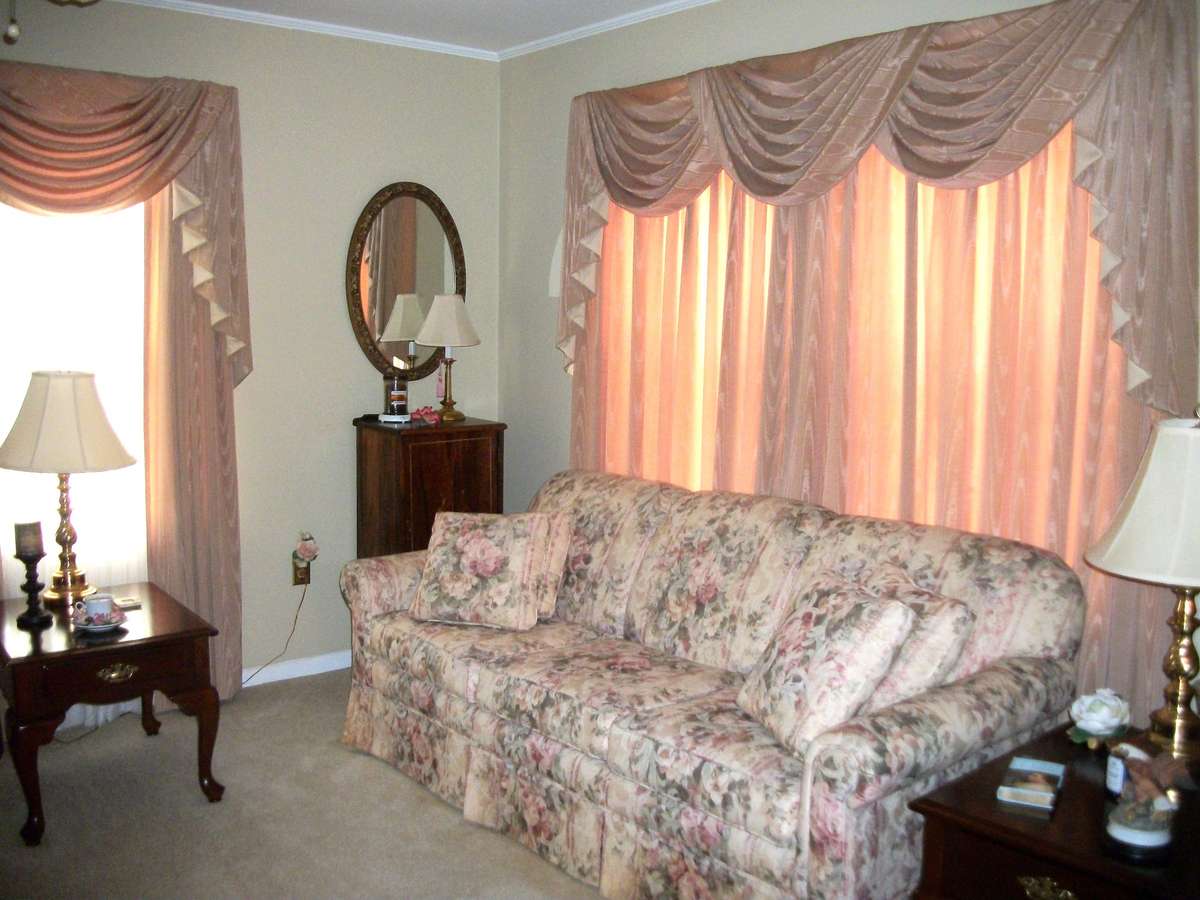 Formal Living Room with loads of windows for natural llight