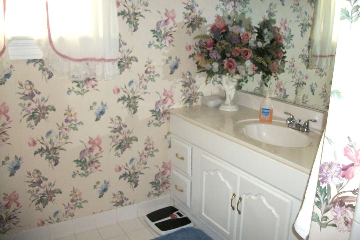 Hall Bath with tile floors