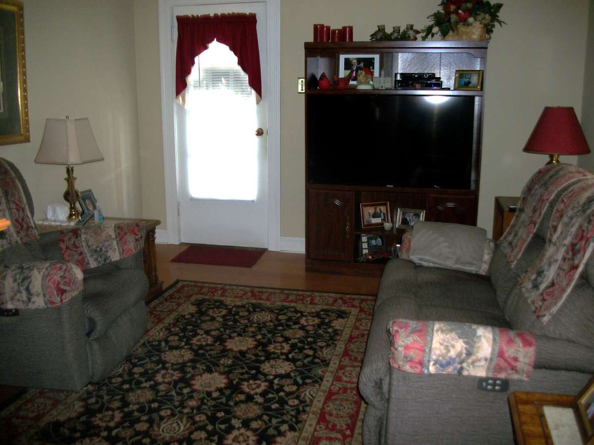 Den area off from Side Entrance.  Lots of hardwood throughout the home