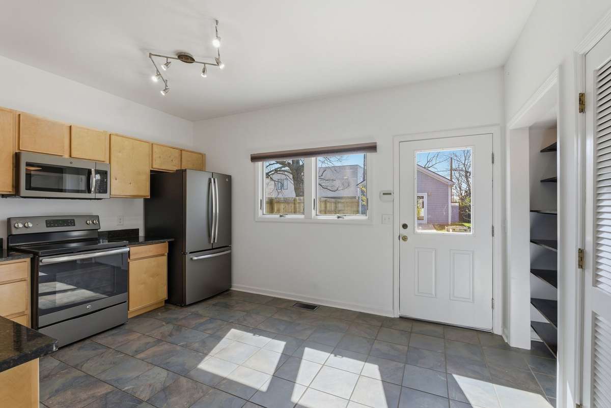 The kitchen has all stainless appliances