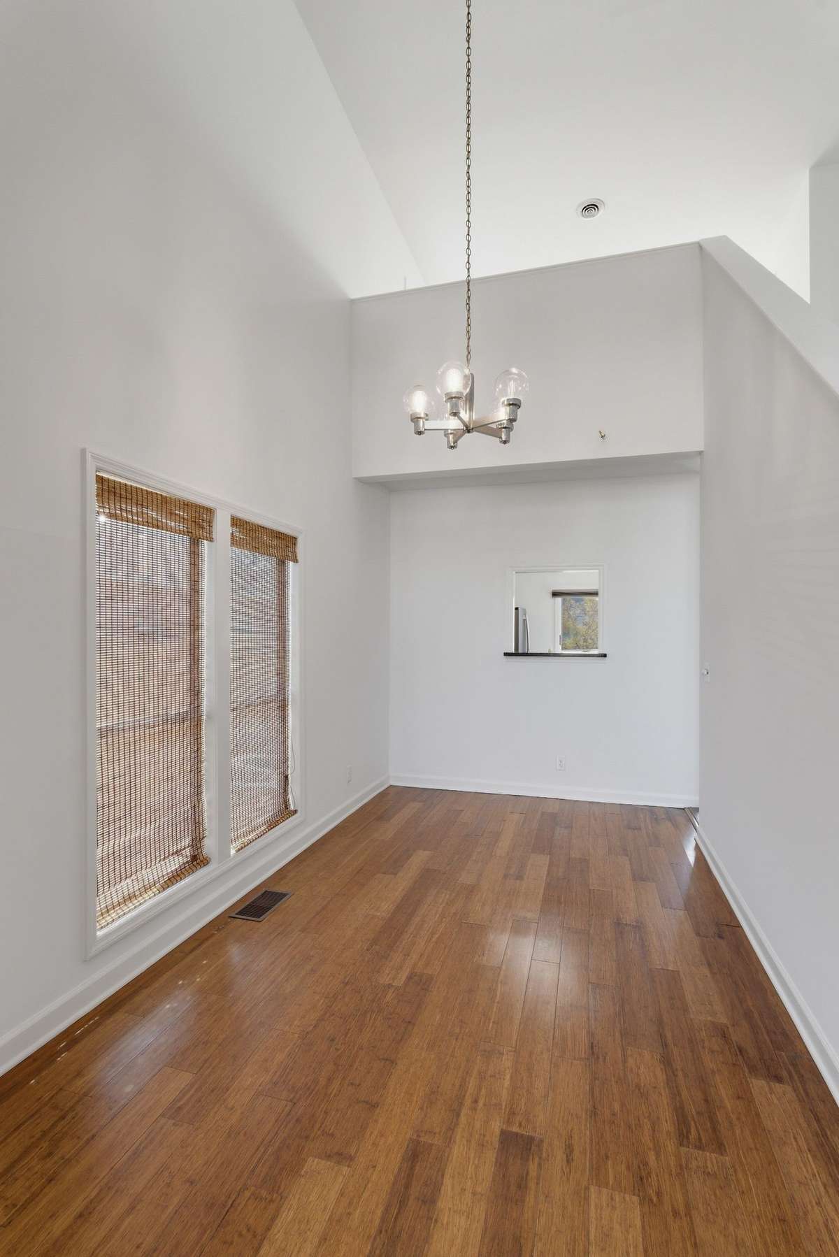 Dining room with vaulted ceiling