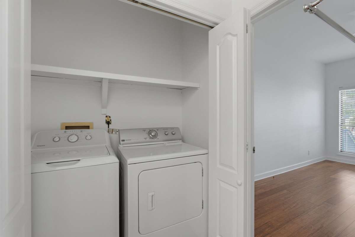 laundry closet with washer/dryer hook ups