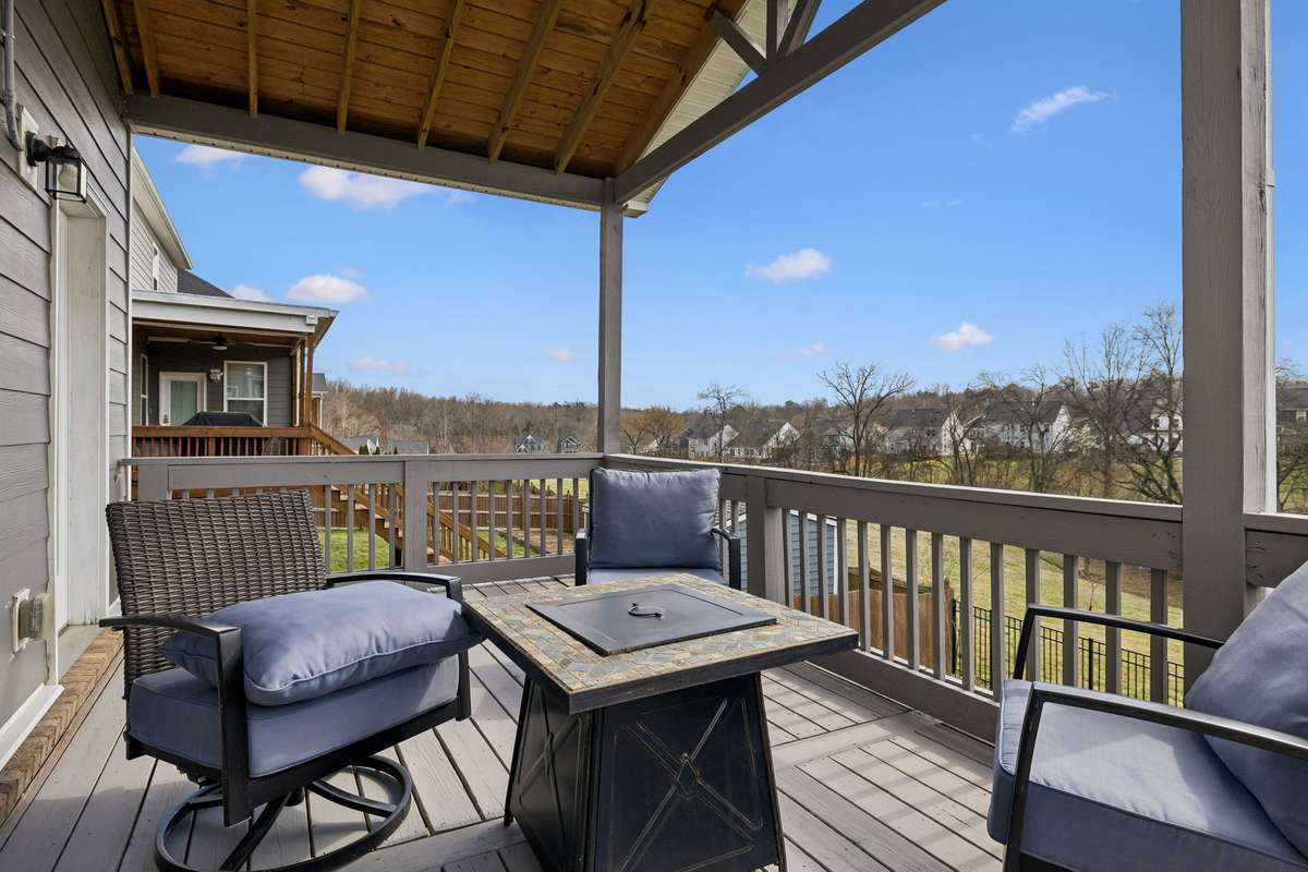 Covered patio with fan, tv wiring, and gas hook up for grilling!