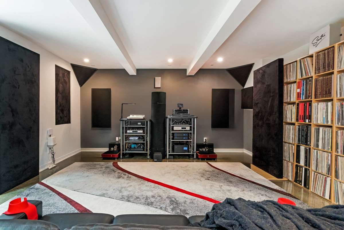 The finished walk-out lower level is currently designed as a music lover’s dream space, but is also suited to be a 5BR or in-law suite, complete with an en-suite bath and walk-in closet.