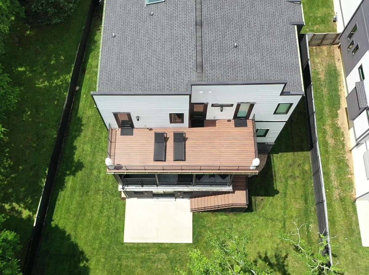 Back upper deck and lower covered porch