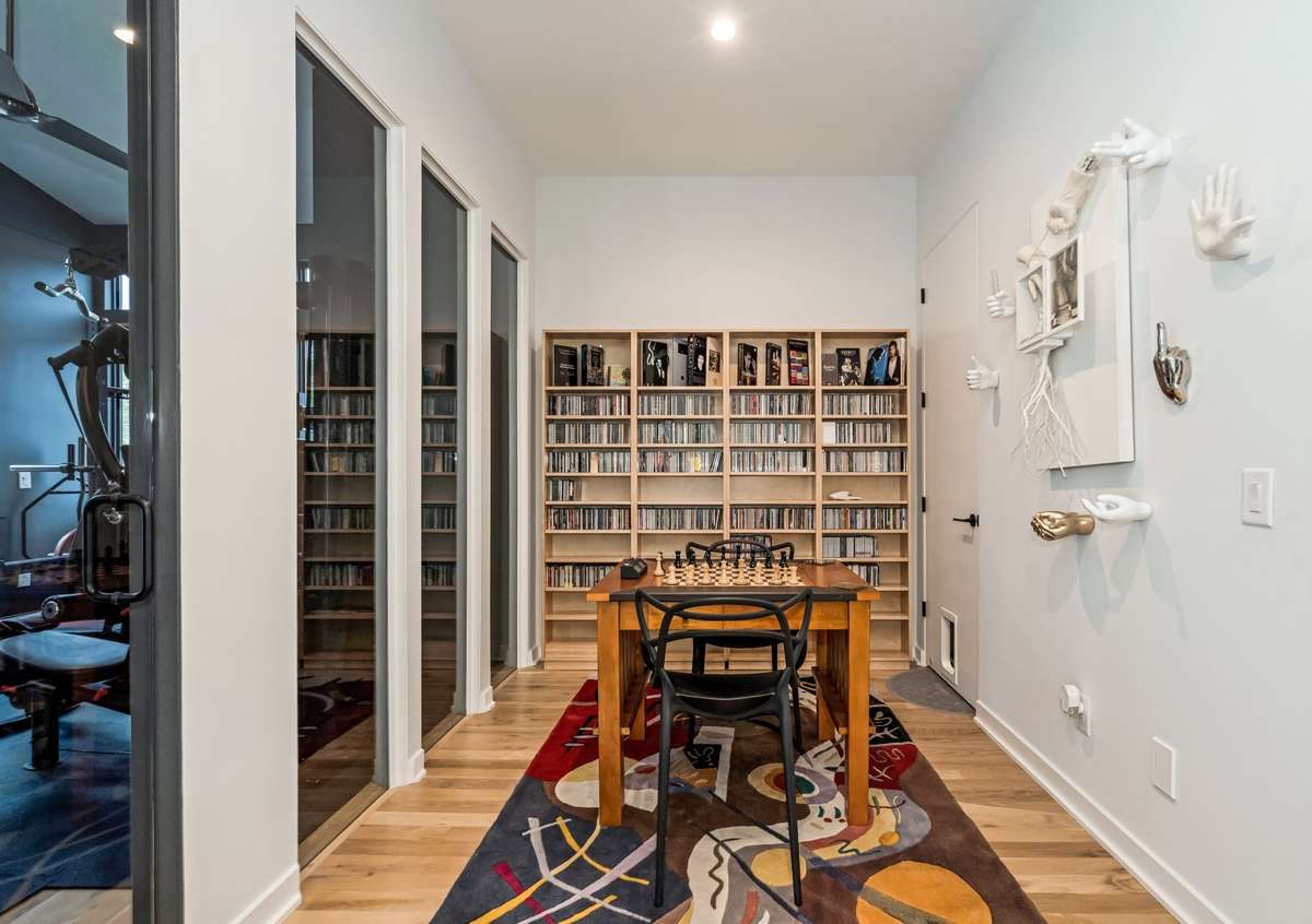 Flex space/sitting room off the bonus room is adjacent to the office/exercise room and upstairs laundry room