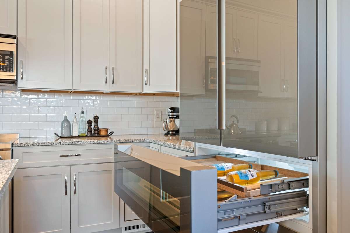 Bosch French Door Refrigerator with built-in wine drawer and pull out freezer.