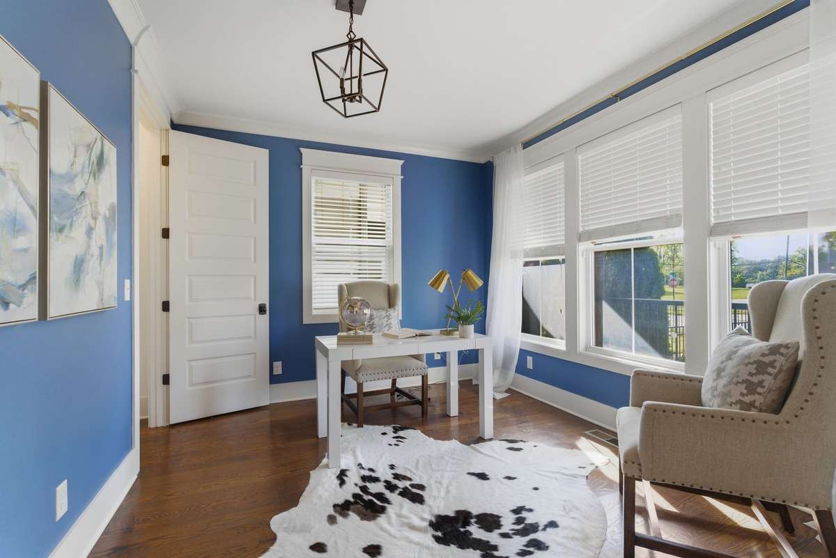 A home office or flex space with abundant natural light.