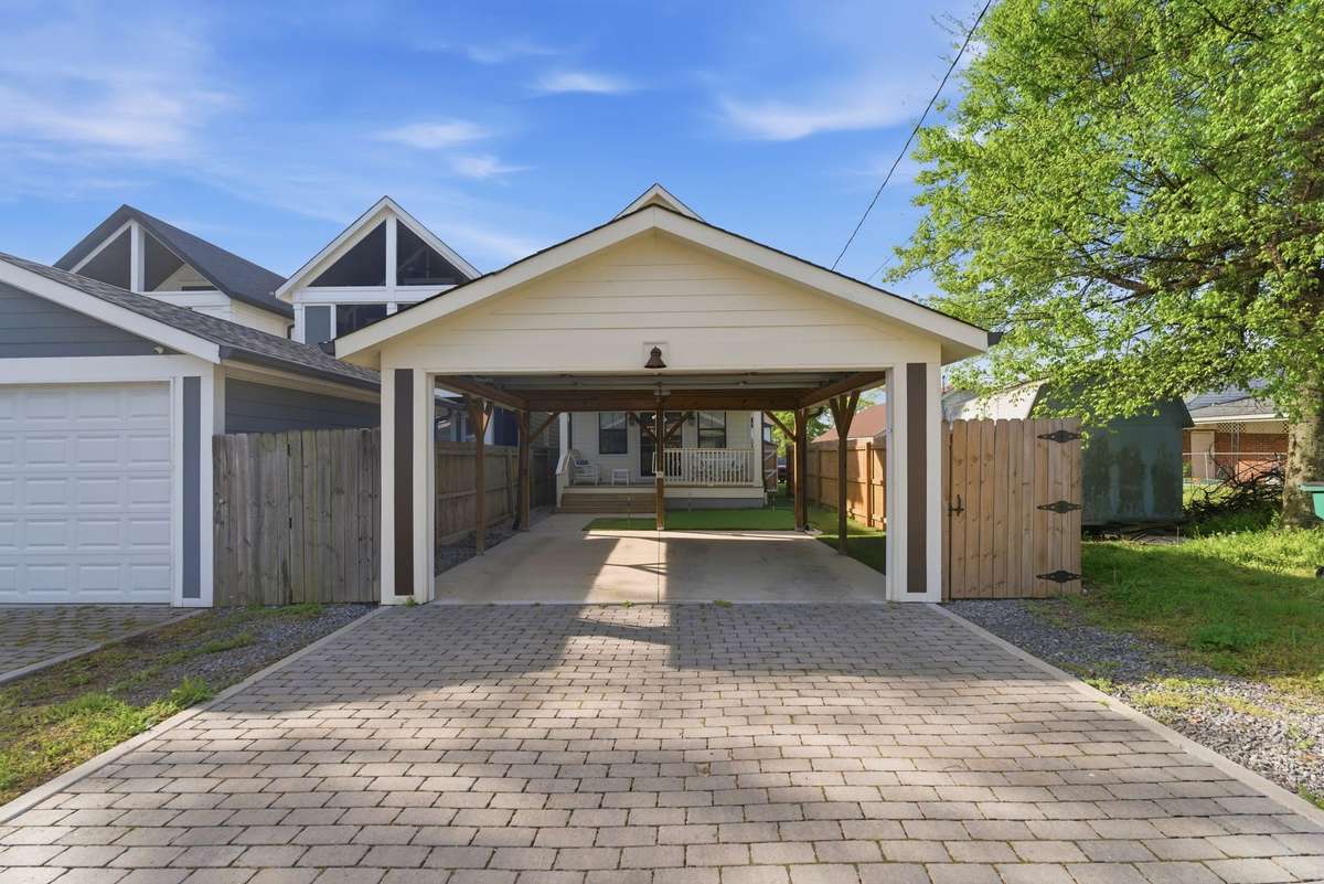Detached garage with alley access.