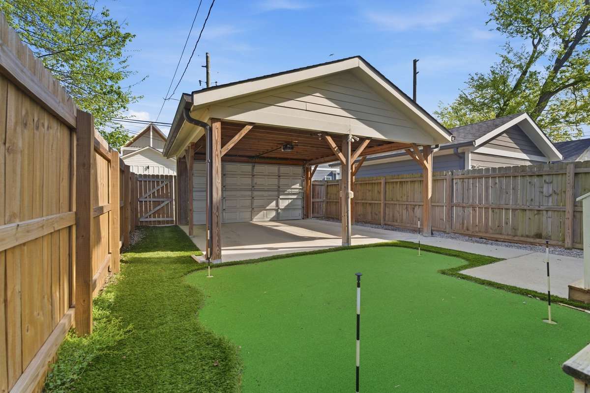 Fenced backyard. Make your friends green with envy with your own personal putting green.