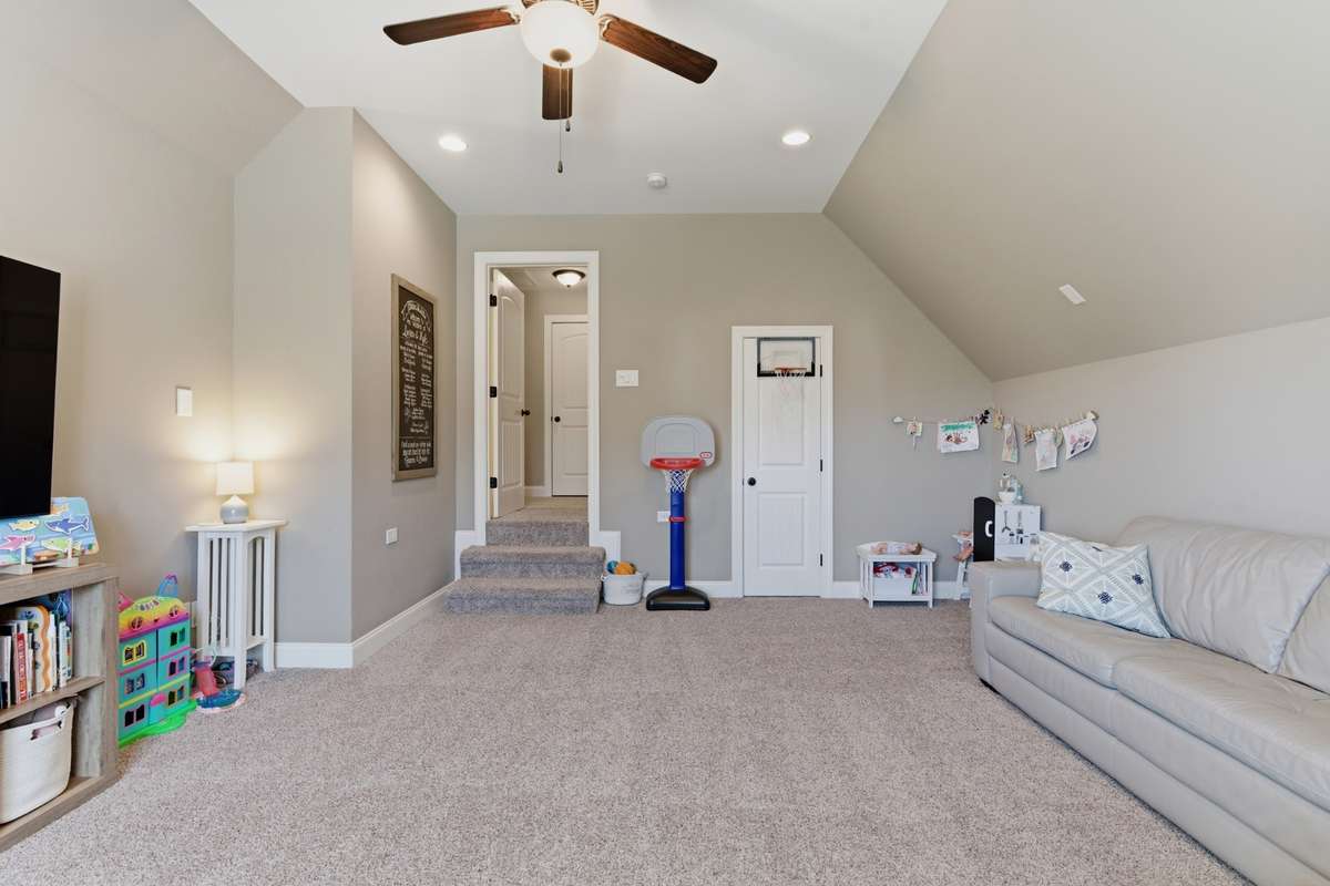 There is a large walk-in closet for storage of games/toys and close access to a hallway bathroom.