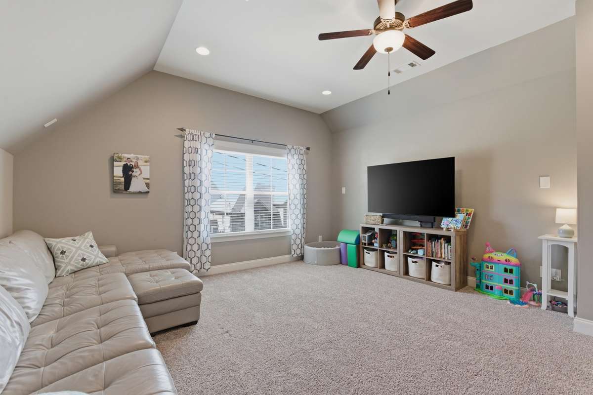 Having a high ceiling and being prewired for surround sound will make this Bonus room a favorite place to hang out and watch a show or game.