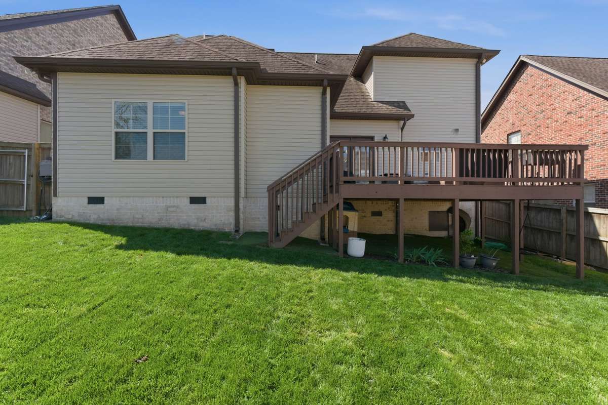The fenced backyard is spacious to play and possibly garden. The large 19x14 deck is a great place to grill or relax and watch the kids play.