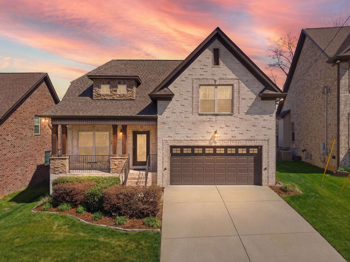 This beautiful home is so charming and has a fenced yard. 

Virtual twilight