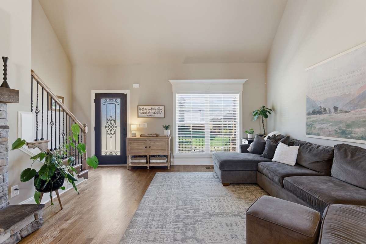 The 2-story great room opens to the kitchen & dining room for a wonderful flow for family & friends to enjoy!