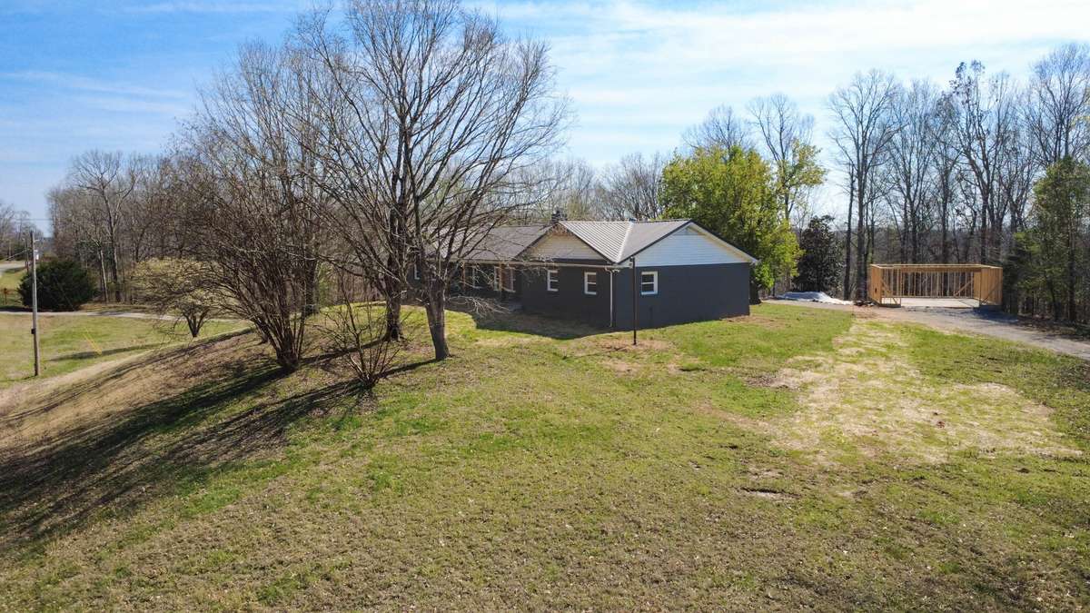 Arial view of side with detached garage (will be completed before closing sale of home)
