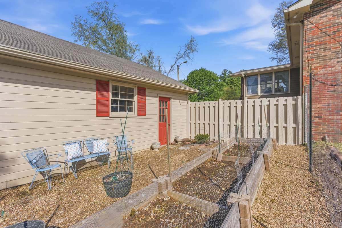 Another view of the garden beside the detached garage.