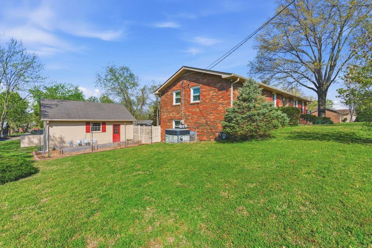 Detached two car garage with storage above.