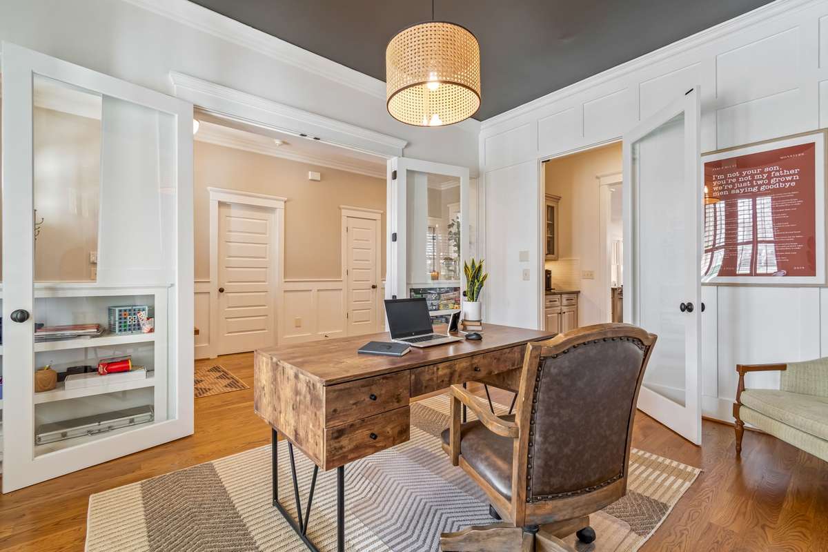 Notice the shelving added for best use of space in the home office...