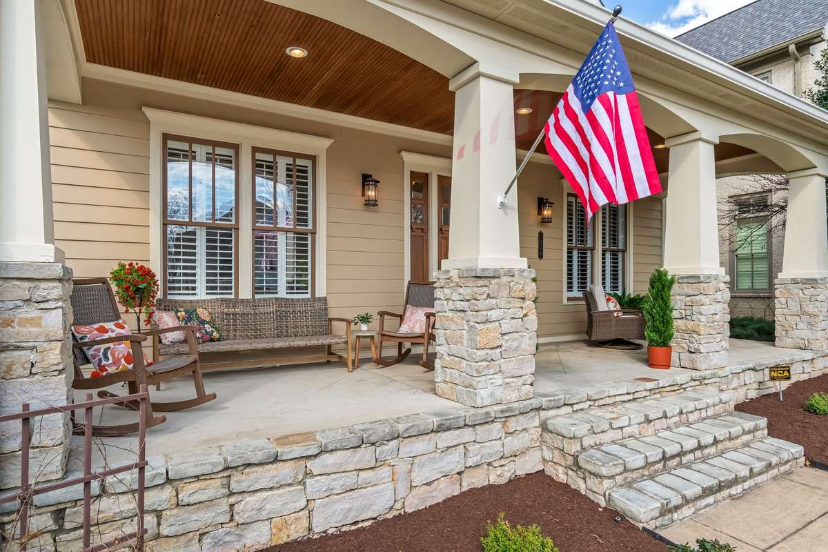 Notice the beautiful stone and beadboard ceiling...
