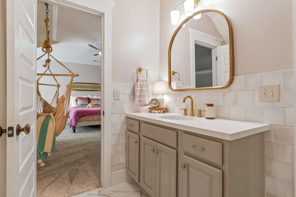 Beautifully updated with new tile and quartz countertops...
