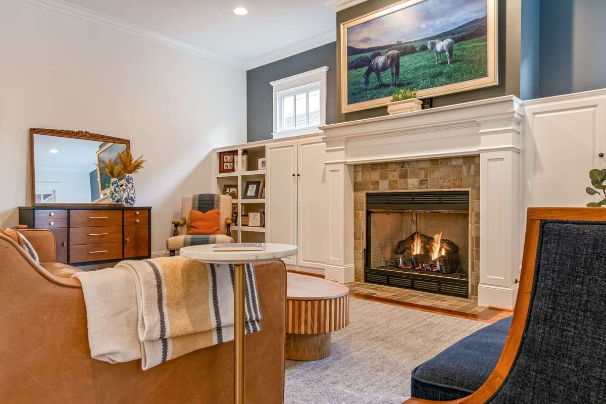 A closer view of the fireplace with beautiful trim...