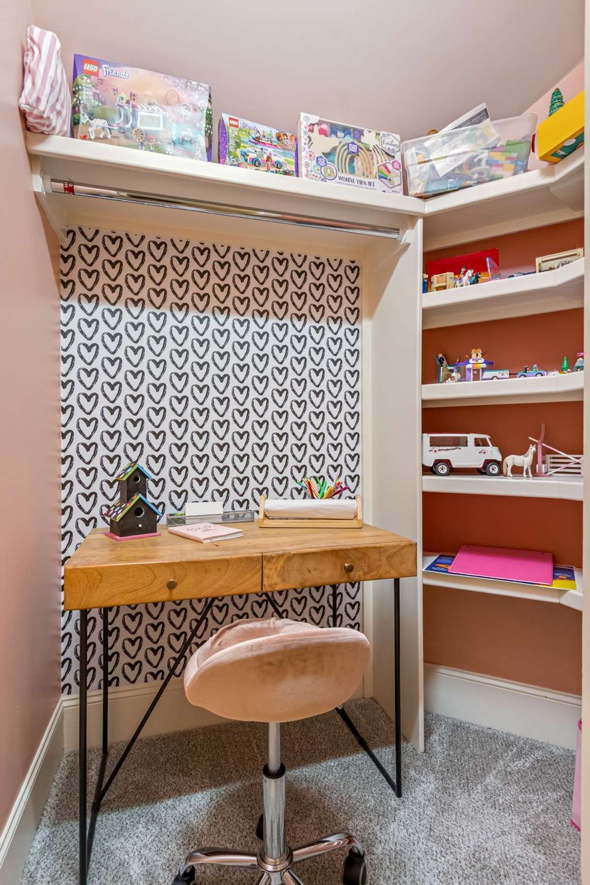 So many closets in this home and this is another one located in the hall...but currently used as an art/game area by one young artist...