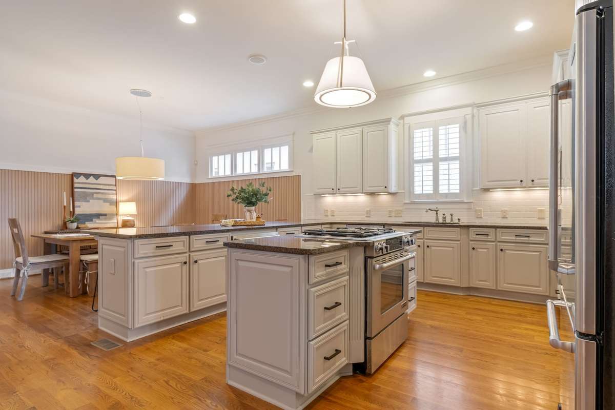 The kitchen is quite spacious...Island hosts the drop in gas range....