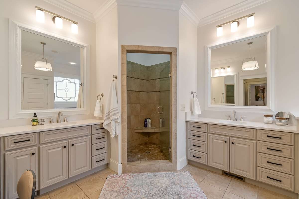 Updated with freshly painted cabinetry, new lighting and new quartz countertops...