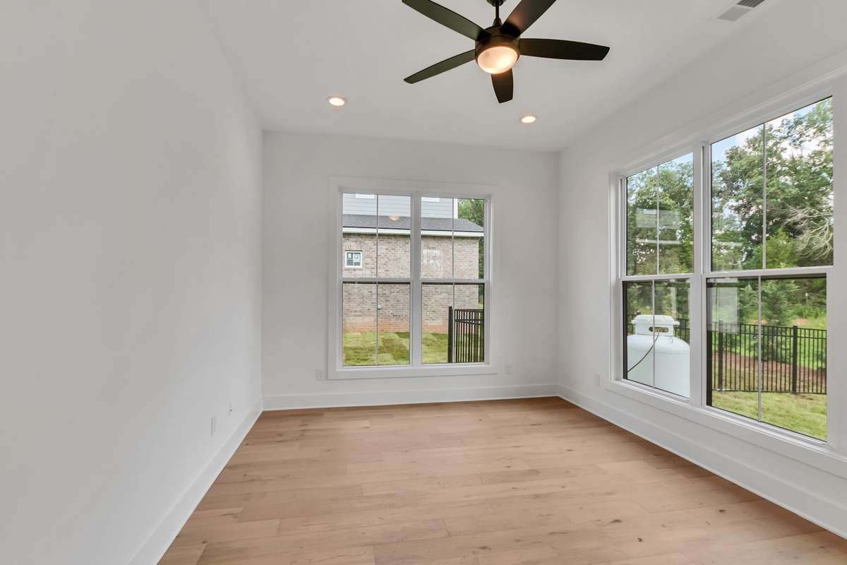 Photo of a previous built Ensley home. Shown for illustration purposes only. Materials and finishes will vary. Ask listing agent for included features on this home. Flex room on main level.