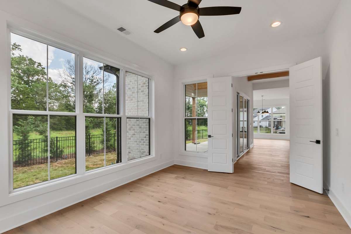Photo of a previous built Ensley home. Shown for illustration purposes only. Materials and finishes will vary. Ask listing agent for included features on this home. Flex room on main level.