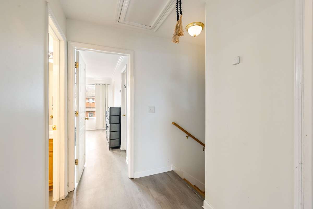 Upstairs hallway. All rooms with updated LVP flooring.