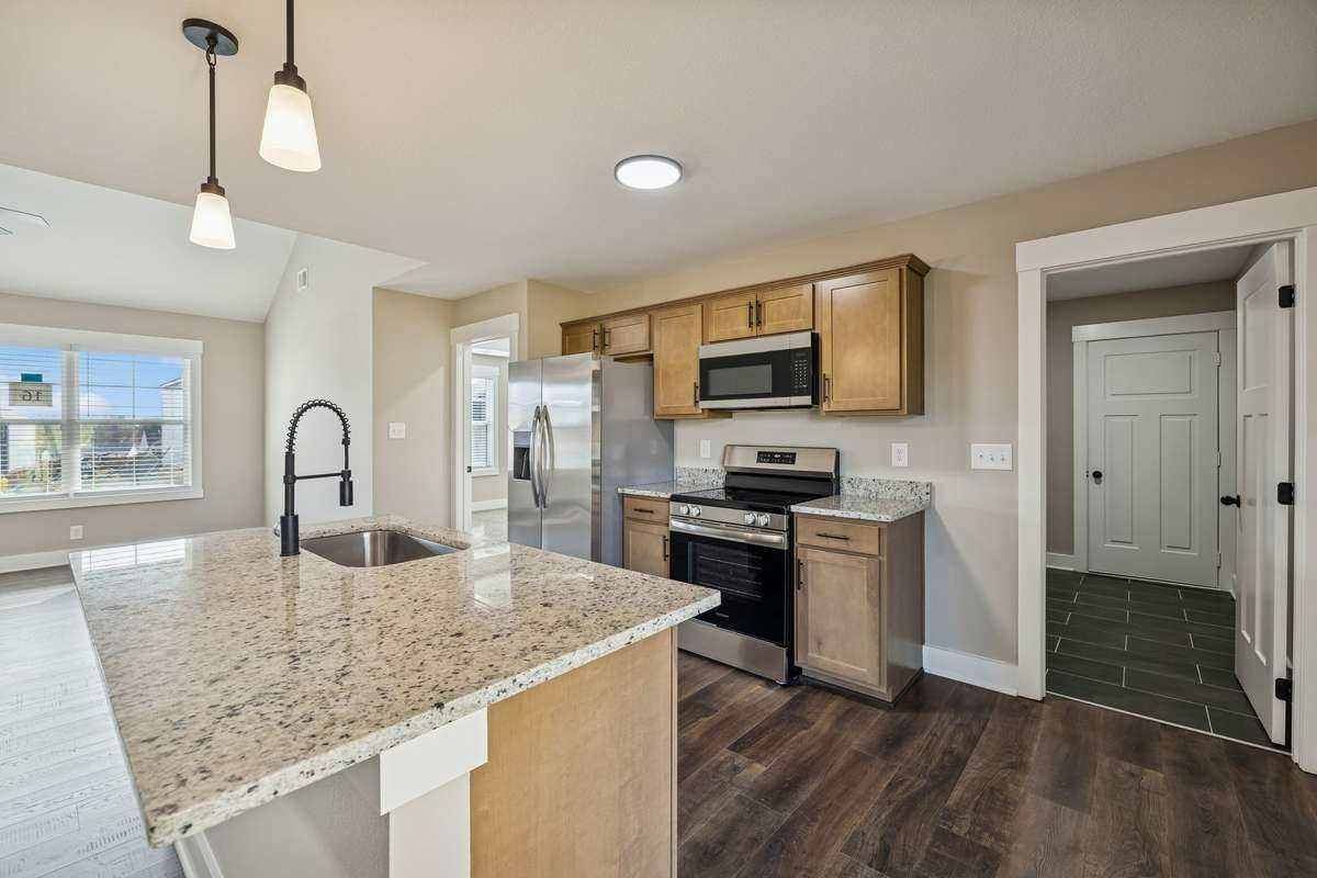 Sample pictures from a previous build showing the Carter Floor Plan.  Materials and colors are subject to change without notice.