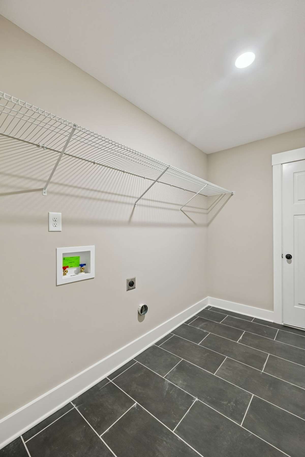 Sample pictures from a previous build showing the Carter Floor Plan.  Materials and colors are subject to change without notice.