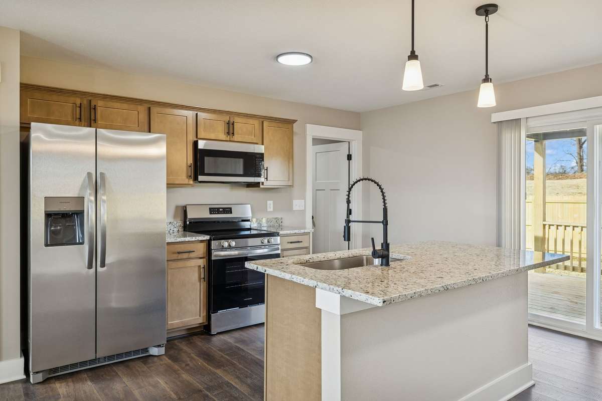 Sample pictures from a previous build showing the Carter Floor Plan.  Materials and colors are subject to change without notice.