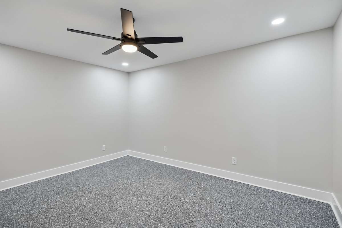 This room in the basement could be used as an additional guest room or office space & features recessed lights & ceiling fan. 763 Thompson Creek Rd. Shelbyville, TN 37160
