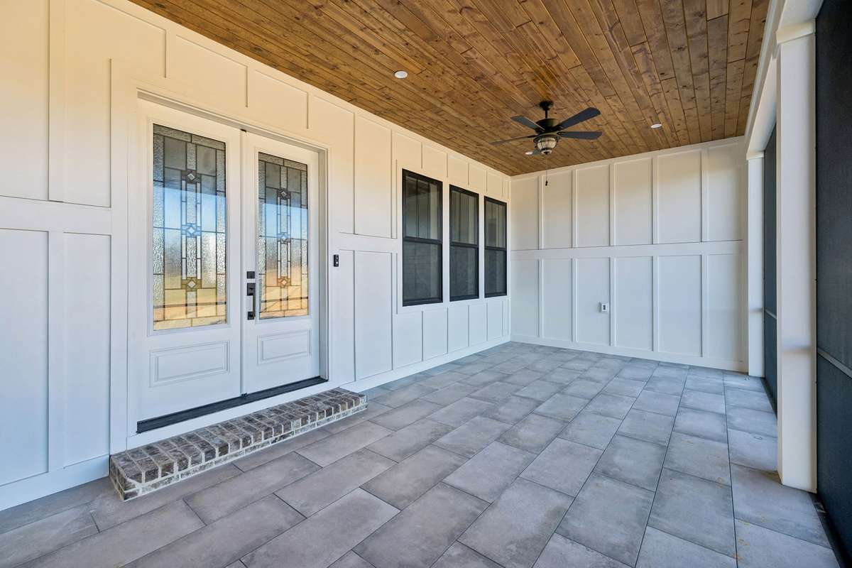 Step outside on your covered back porch with recessed lighting & ceiling fan. 763 Thompson Creek Rd. Shelbyville, TN 37160