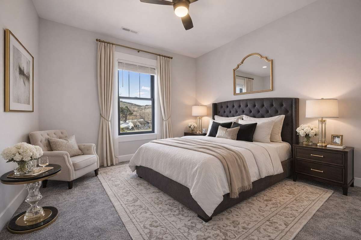 Second bedroom features a window, ceiling fan, & neutral color scheme. 763 Thompson Creek Rd. Shelbyville, TN 37160