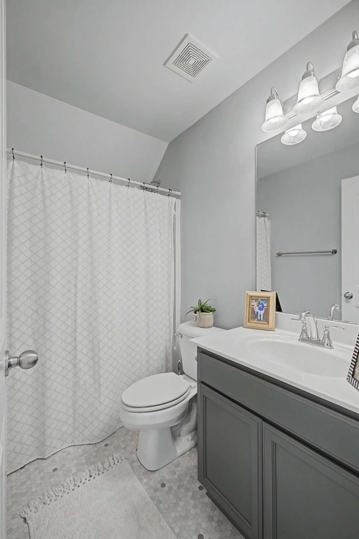 Full Bath #3 located upstairs between the Bonus Room and Bedroom #4