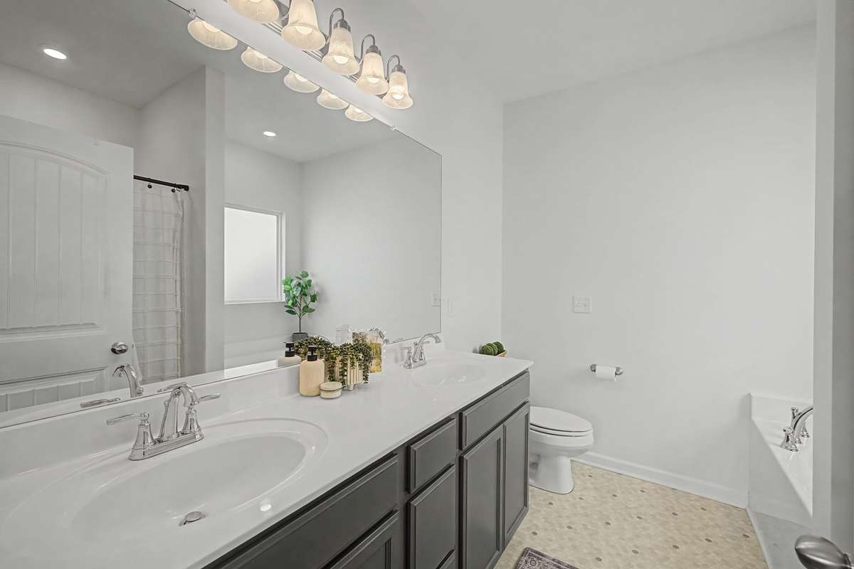 Double Vanities in Primary Bath.