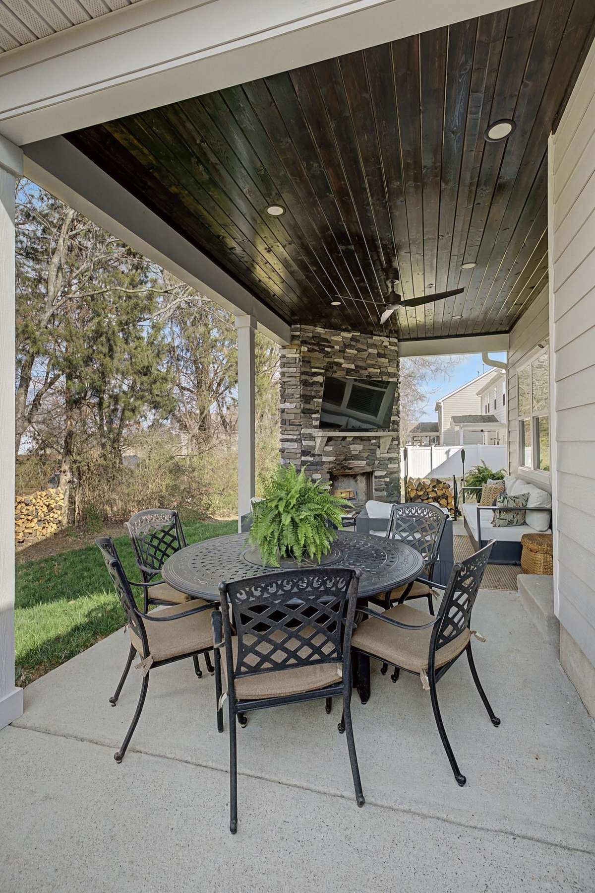 Outdoor Patio Space with Room for Table adjacent to Covered Outdoor Living Space.