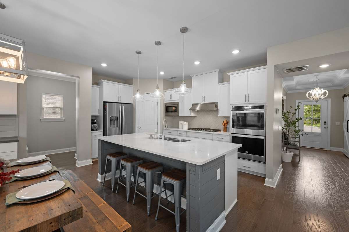 This kitchen features ample storage and generous counter space for everyday cooking and meal prep.