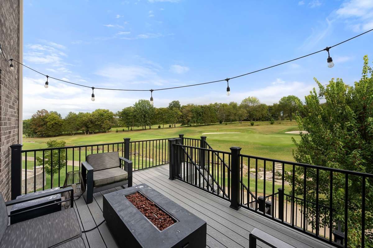 The deck offers beautiful views overlooking the golf course.