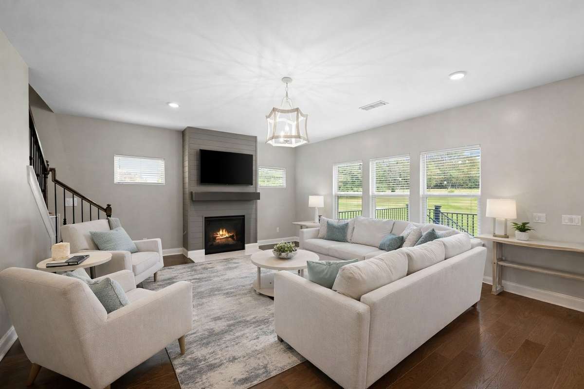 This space is virtually staged to showcase the scale, layout, and how comfortably the room lives.