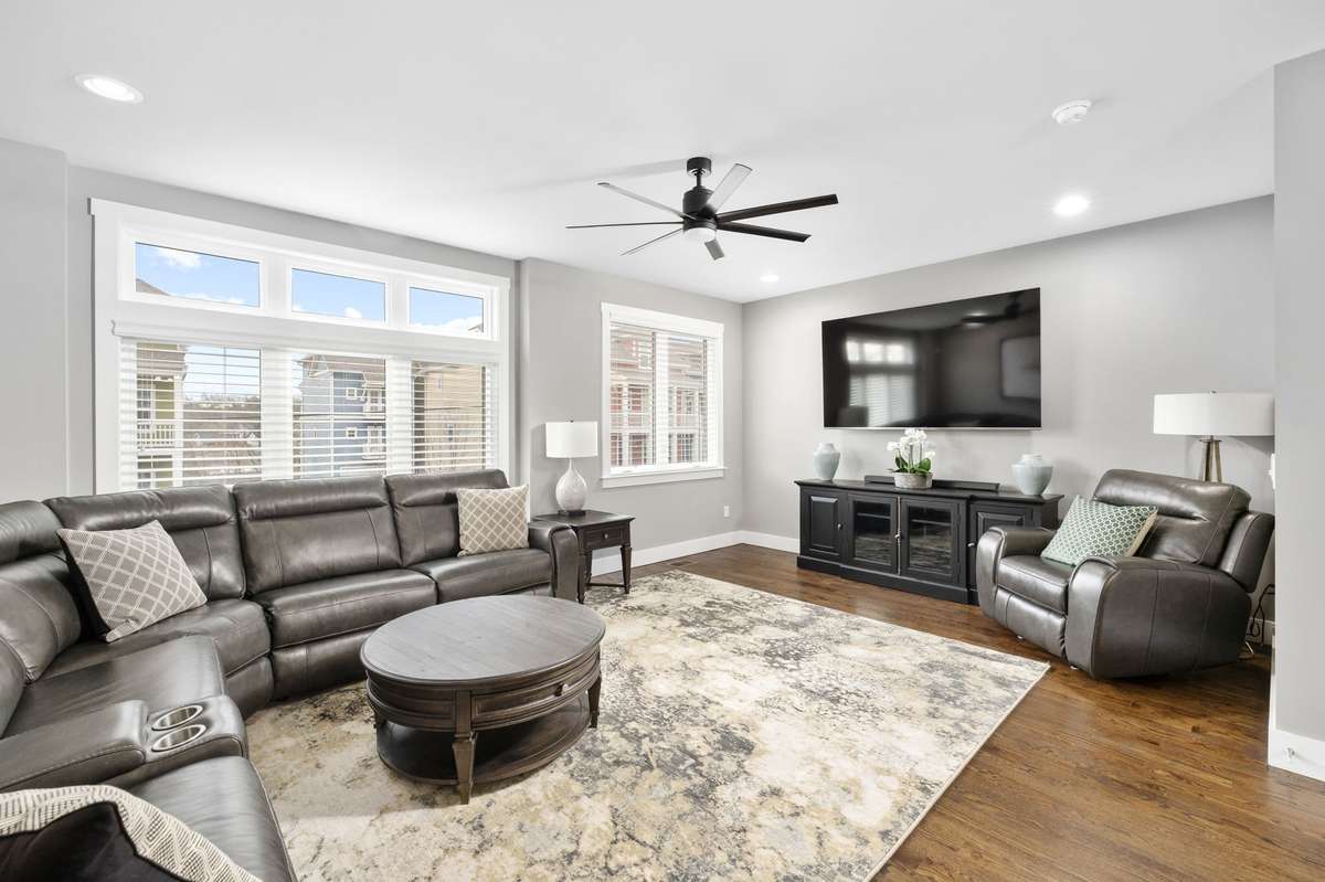 Large living room gives this more of a single home feel.