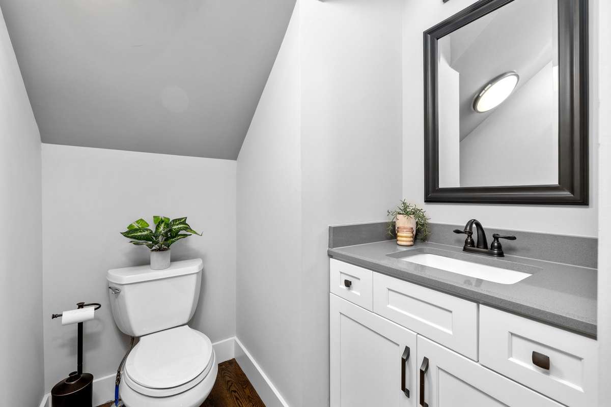 Convenient powder room on the living and kitchen level.