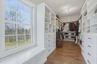 custom Built-ins Primary Closet with window seat!